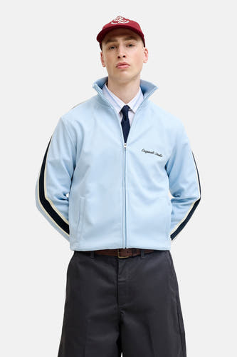 Gilet bleu de ORIGINALS BY JACK & JONES avec fermeture éclair, rayures noires sur les manches et un logo blanc sur la poitrine.