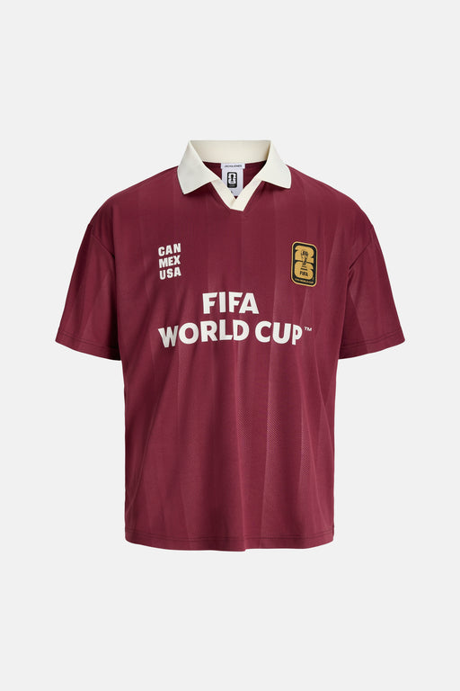 Polo marron de ORIGINALS BY JACK & JONES avec col blanc, rayures verticales, inscription 'CAN MEX USA' et logo et texte de la Coupe du Monde de la FIFA sur la poitrine.