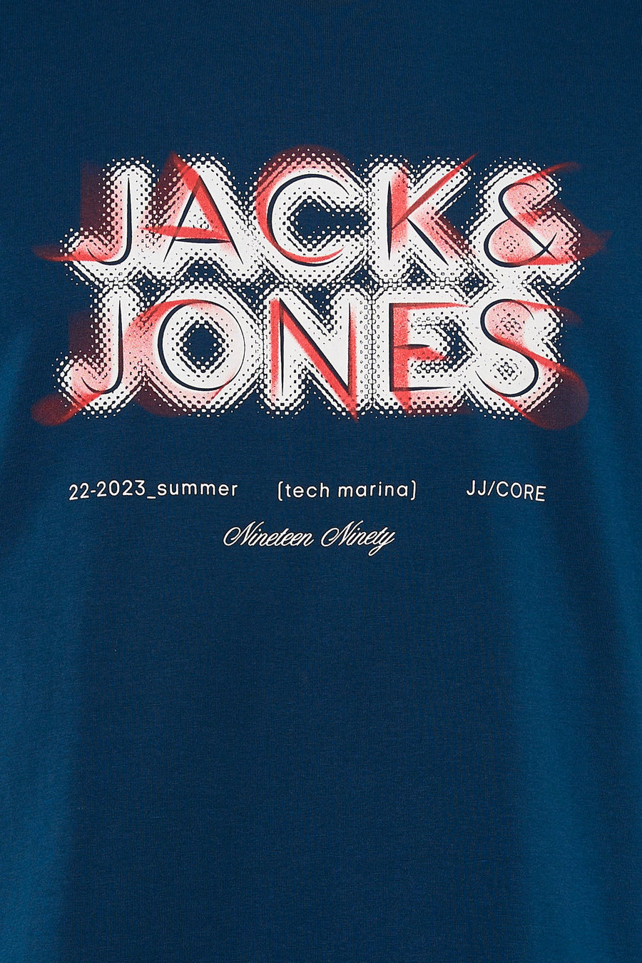 T-shirt à manches courtes bleu de CORE BY JACK & JONES, avec un imprimé blanc et des accents rouges.
