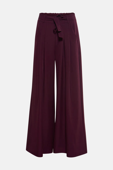 Pantalon Bordeaux Terra di Siena avec ceinture élastique et plis.