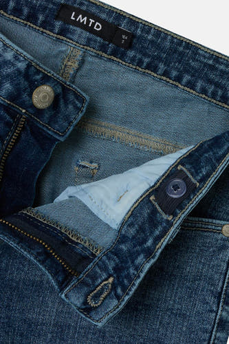 Jean droit bleu marine de LMTD, avec ce ce taille ajustable et une fermeture à glissière.
