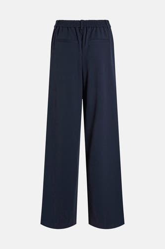 Pantalon bleu de VILA avec ce taille élastique et des jambes larges, vu de l'arrière.