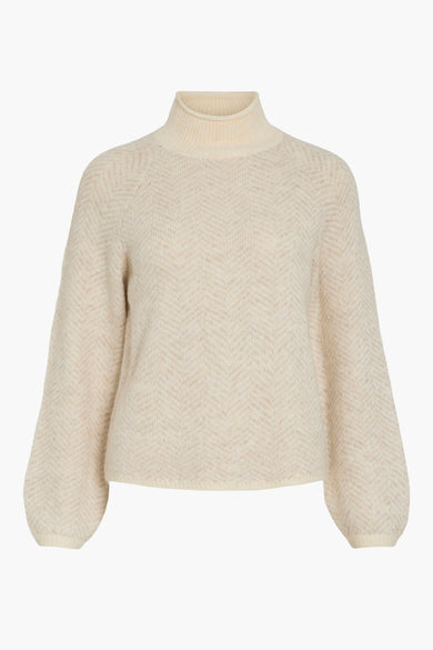 Gilet à col rond beige de VILA®, avec des manches longues et un subtil motif rayé.