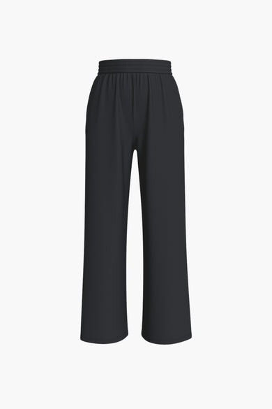 Pantalon noir de VILA®, avec des jambes larges et une ceinture élastique.