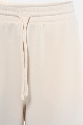 Pantalon de couleur beige de VILA, avec cordon de serrage à la taille.