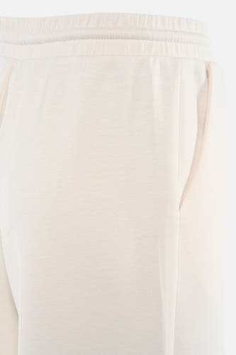 Pantalon de couleur beige de VILA, avec taille élastique et poches latérales.