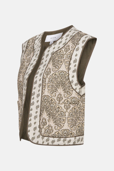 Gilet multicolore de VILA avec un motif floral et une bordure verte foncée.