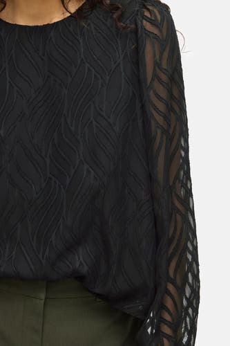 Blouse noire à manches longues de VILA®, avec un motif de feuilles et des manches transparentes.
