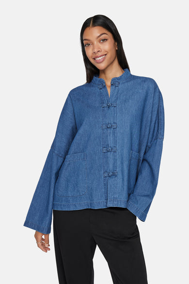 T-shirt en denim - denim bleu moyen de VILA® avec longues manches et fermeture chinoise.