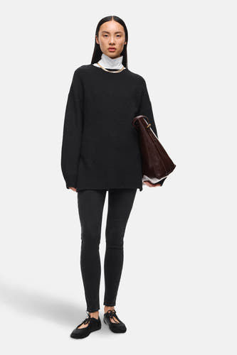 Jean skinny noir de VILA, avec poches et fermeture à glissière.