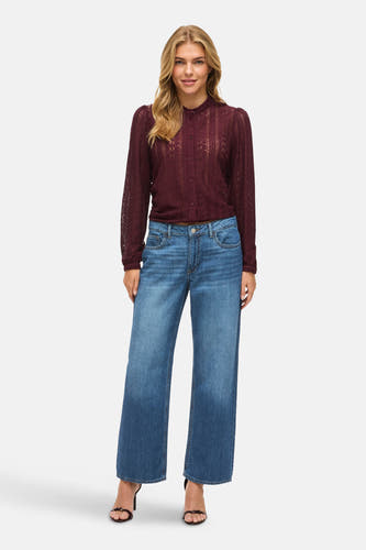 Jean bleu de VILA®, en denim, avec des jambes larges et une ceinture classique.