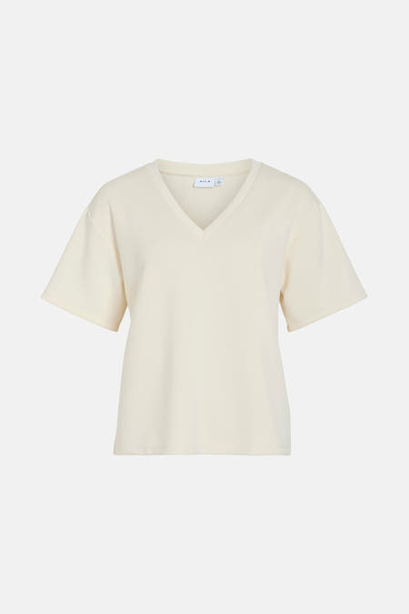 T-shirt beige à manches courtes de VILA, couleur unie et col V.