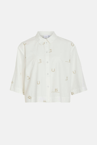 Chemise blanche à manches courtes de VILA®, ornée de motifs brodés de cowboys.