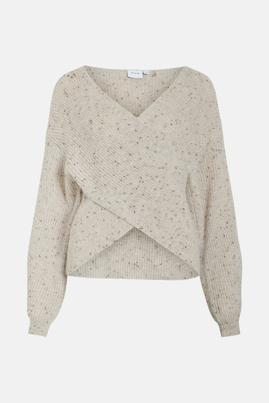 Gilet beige de VILA, avec devant croisé et côtes irrégulières.