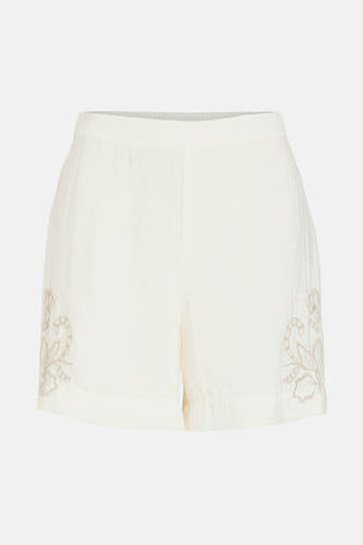 Pantalon court blanc de VILA, avec des détails de fleurs brodés sur les deux jambes.