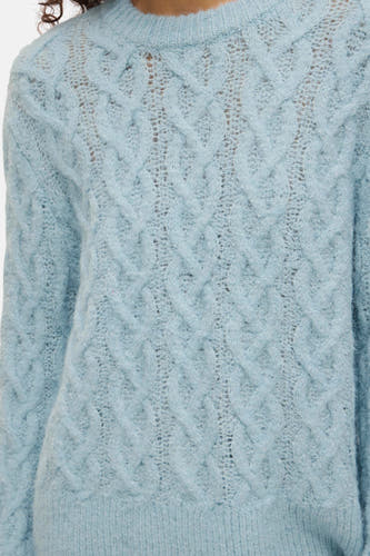 Sweat-shirt bleu avec col rond de VILA®, motif côtelé et texture douce.