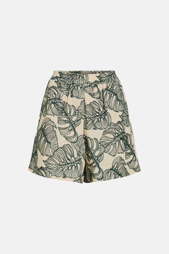 Shorts de couleur crème avec imprimé feuilles vertes de VILA® et taille élastique, photographiés à plat.