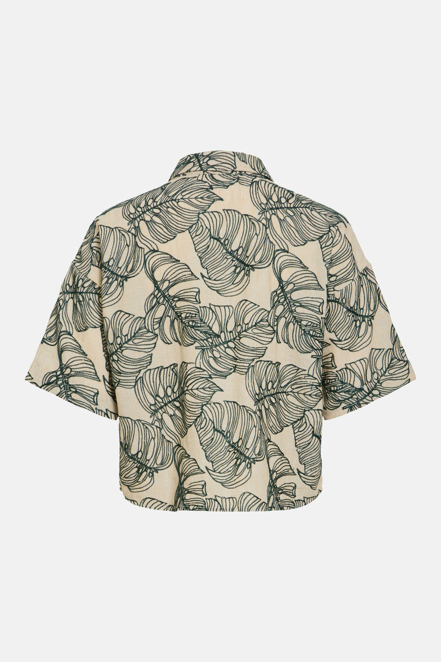 Chemise verte à manches courtes de VILA® avec base beige et feuilles tropicales brodées, vue arrière.