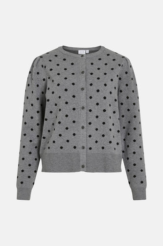 Grijze cardigan met zwarte stippen.