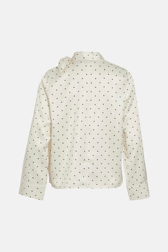Blouse écru à manches longues de Vila, avec un motif à pois intégral et un nœud au col.