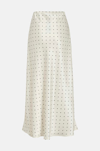 Jupe longue écru de VILA® avec un motif à pois intégral et une coupe élégante et fluide.