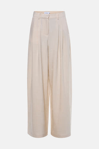 Pantalon beige de VILA® avec un motif floral subtil et des jambes larges, vu de dos.