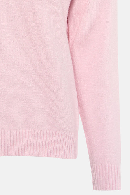 Pull rose à col rond ONLY®, avec une texture finement tricotée et une finition côtelée.