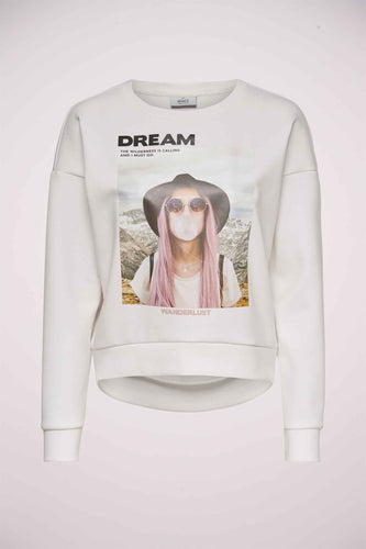 Gilet à motifs de couleurs avec un imprimé d'une femme aux cheveux roses et le texte "DREAM" et "WANDERLUST".