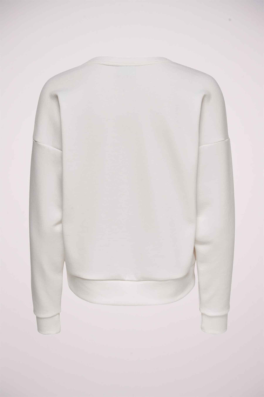 Dos d'un pull couleur crème.