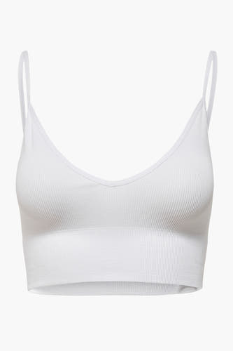 Buste blanche ONLY, avec des bretelles fines et une texture côtelée.