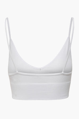 Bustier blanc ONLY, avec des bretelles fines et une structure côtelée.