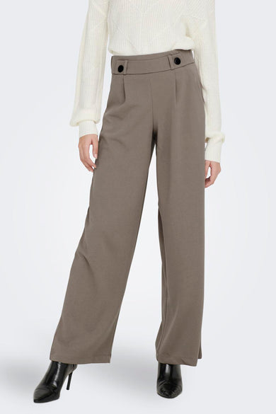 Pantalon de costume beige JDY, avec des jambes larges et une ceinture élastique, vu de derrière.