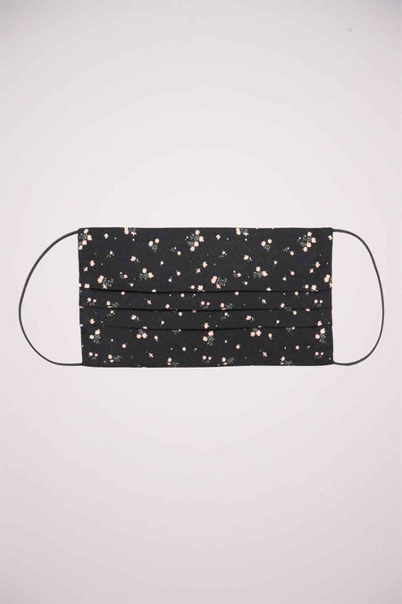 Masque à bouche noir de ONLY®, avec un fin motif floral et des bandes élastiques.