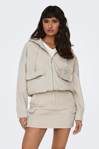 Blouson écru ONLY, avec capuche, poches et fermeture éclair à l'avant.