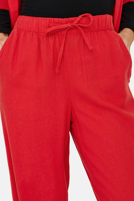 Pantalon rouge de ONLY, avec cordon de serrage à la taille et poches.