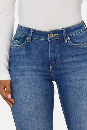 Jean skinny bleu marine de ONLY, avec des boutons dorés et une légère usure.