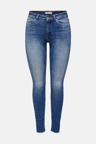 Jean skinny en denim bleu de ONLY, avec une légère usure et un bord côtelé.
