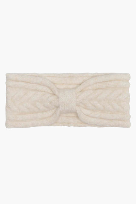 Écru oreillettes de ONLY avec motif côtelé et une nœud décoratif au milieu.