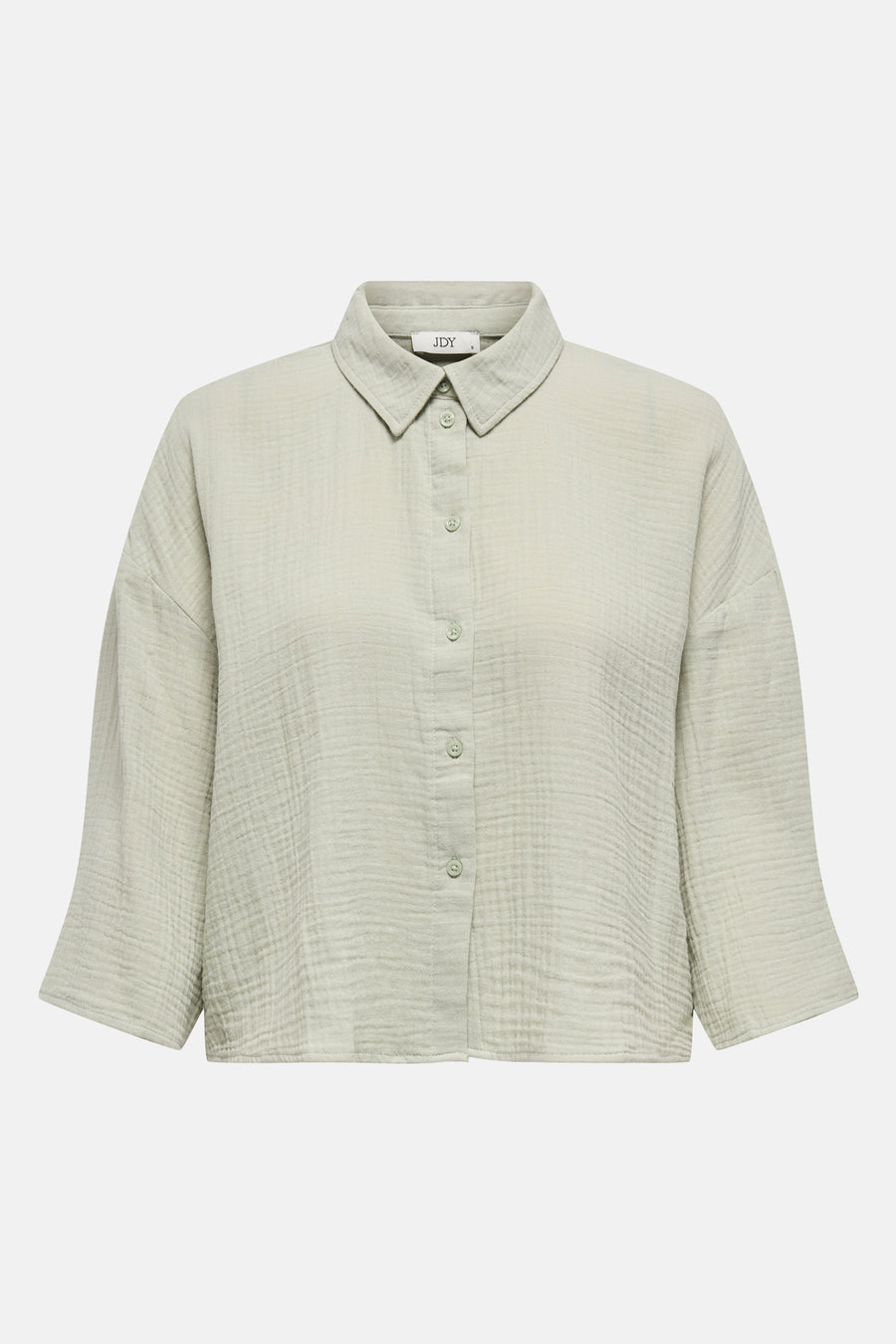 Chemise verte à manches courtes de JDY, avec une légère texture crêpe et une fermeture à boutons.