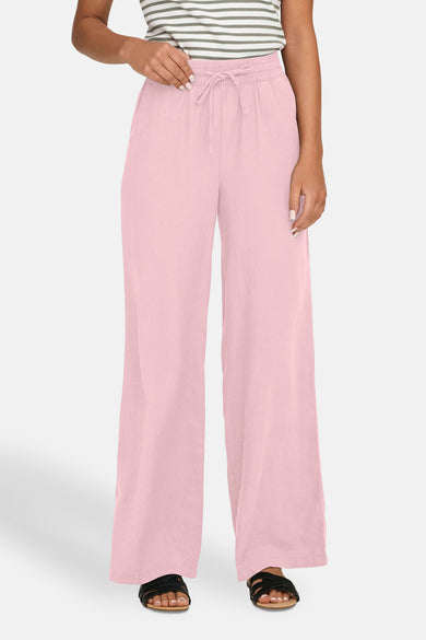 Pantalon rose de JDY, avec des jambes larges, une ceinture élastique avec cordon et des sandales.