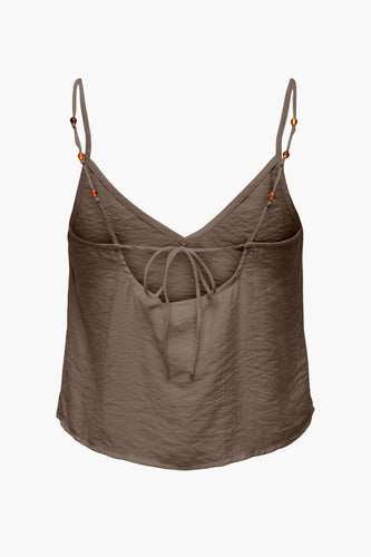 Bruinbruine top met parels.
