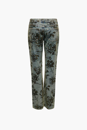 Rechte jeans van denim in middenblauw van ONLY®, met een zwart bloemenpatroon over het gehele oppervlak.
