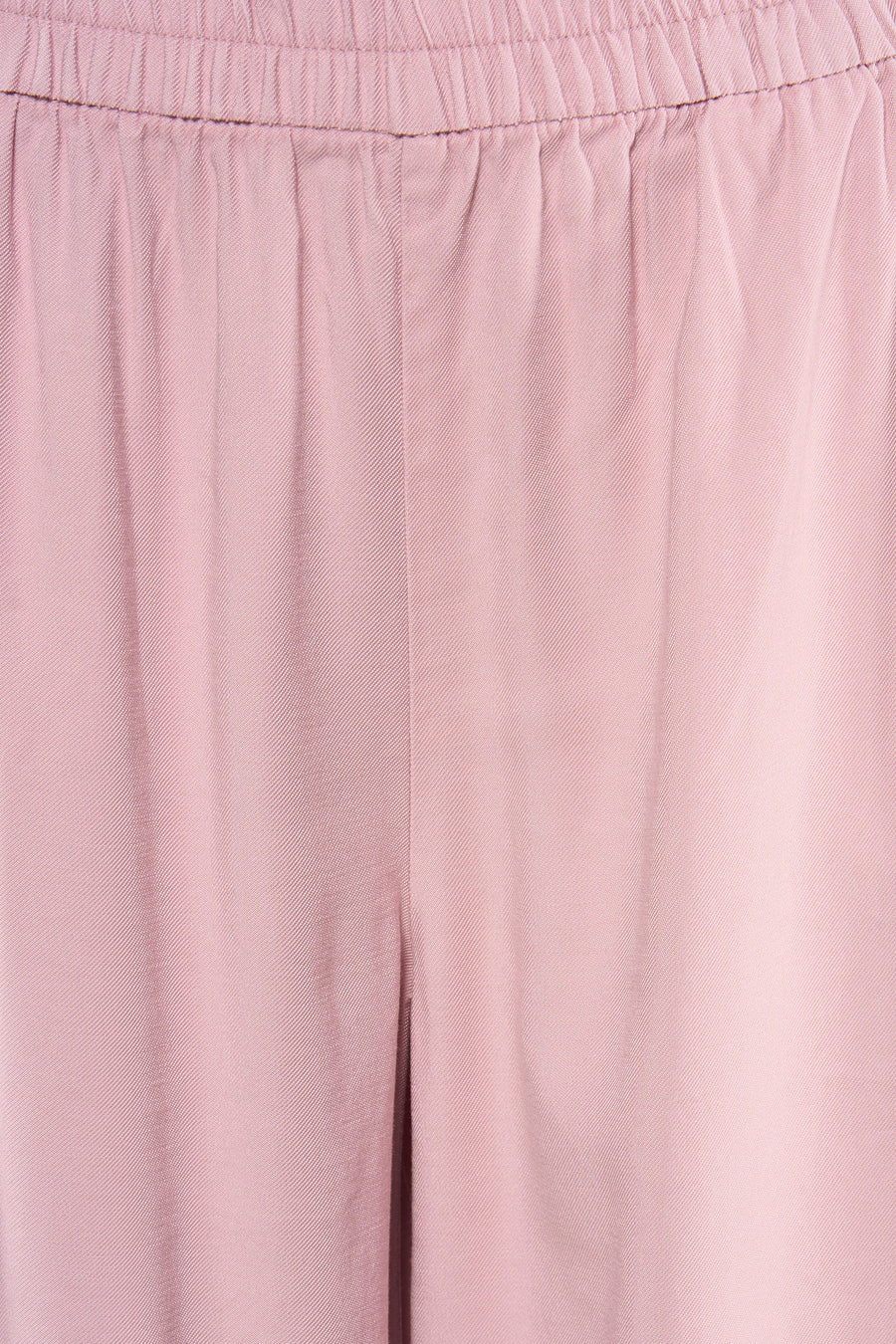 Pantalon rose ONLY® avec taille élastique et texture subtile.