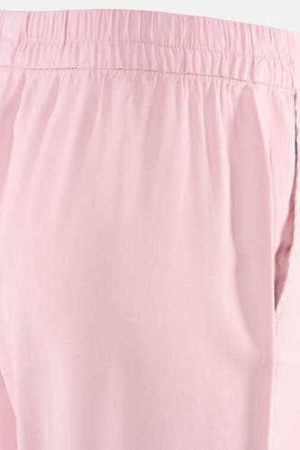 Pantalon rose clair de ONLY® avec taille élastique, plis et une poche latérale.