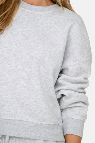 Pull-over gris ONLY®, couleur unie, avec des manches longues et un col rond.