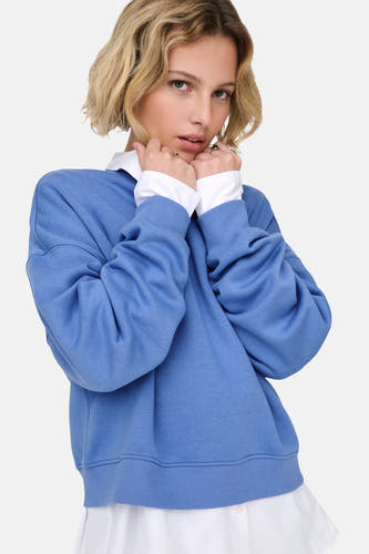 Sweat-shirt bleu de ONLY, avec des manches longues et un col et veste blanc et des poignets.