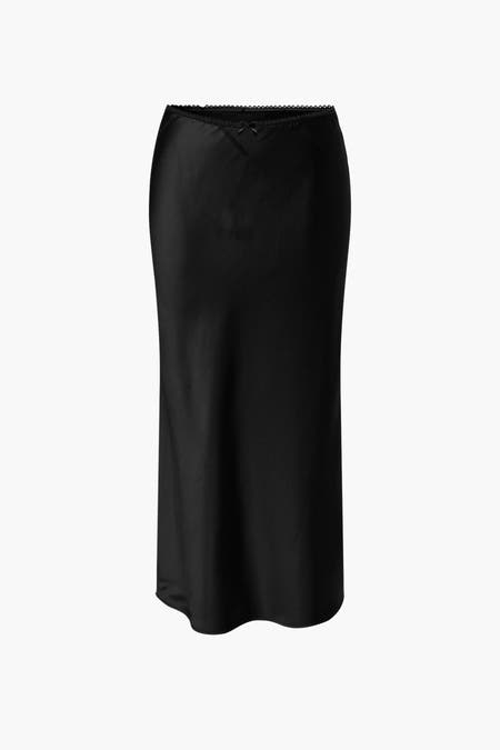 Longue jupe noire ONLY® avec bordure sur le haut et plis subtils.