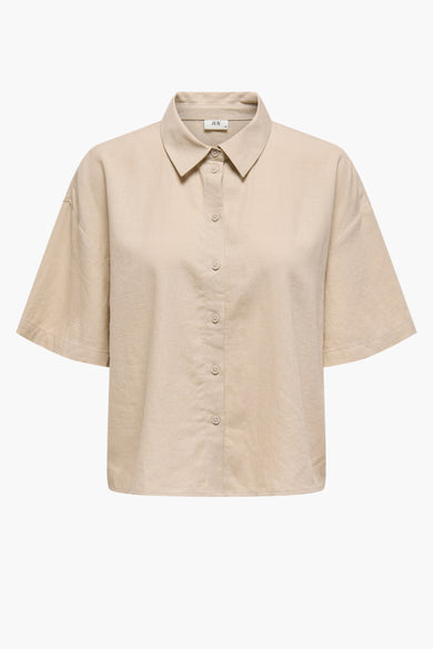 Chemise écru à manches courtes de JDY, avec fermeture à boutons et col classique.