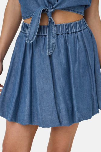 Short blue denim skirt from ONLY, with an elastic waistband and button detail.