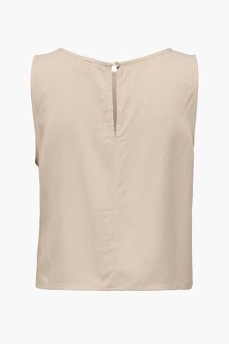 Blouse beige JDY avec détail de nœud à l'arrière et modèle sans manches.